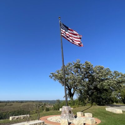Memorial Park, Flag and military service markers near overlook.