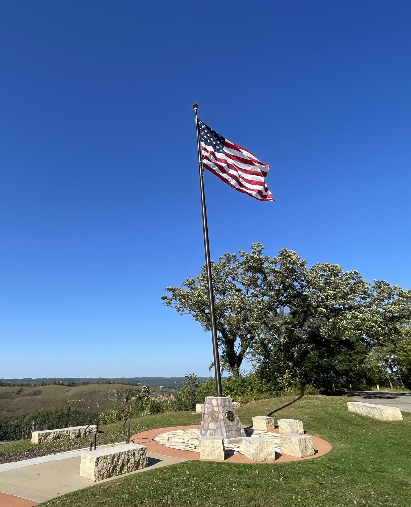 Memorial Park, Flag and military service markers near overlook.
