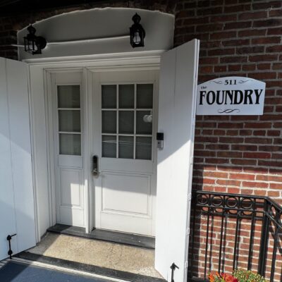 Photo of the front door of the Foundry (The St James Hotel Flat property). A short term rental one bedroom.