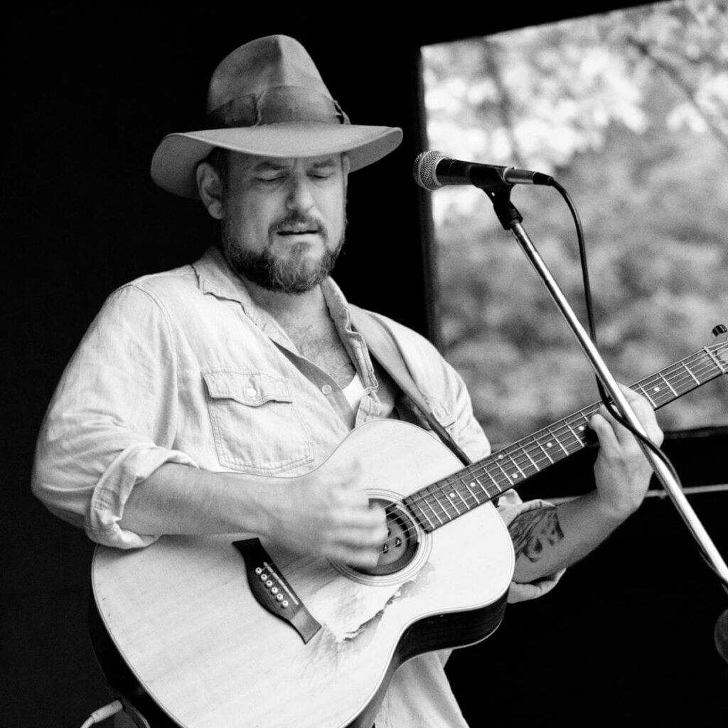photo of Tony Cuchetti playing the guitar in red wing mn