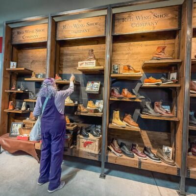 Red Wing Shoe Co. image of wall of shoes in retail store