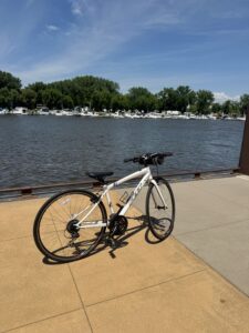 Photo of bike at Levee Park in Red Wing, MN - background of mississippi river. Bike rental from St James Hotel 