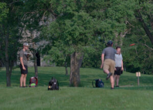 Men playing Disc Golf