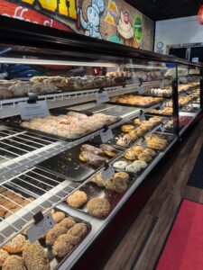Hanisch Bakery in Red Wing MN display case of donuts and cookies 